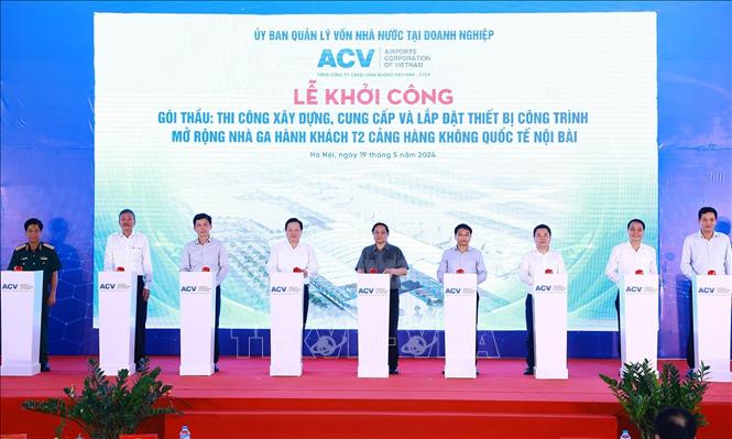 vna_potal_prime_minister_attends_ground-breaking_ceremony_for_noi_bai’s_terminal_2_project_stand.jpg